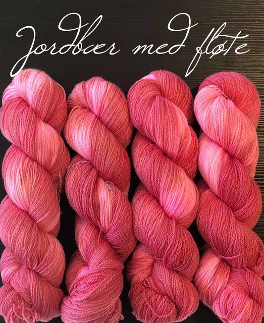 Kvitlammets Luksus merino. Jordbær med fløte.