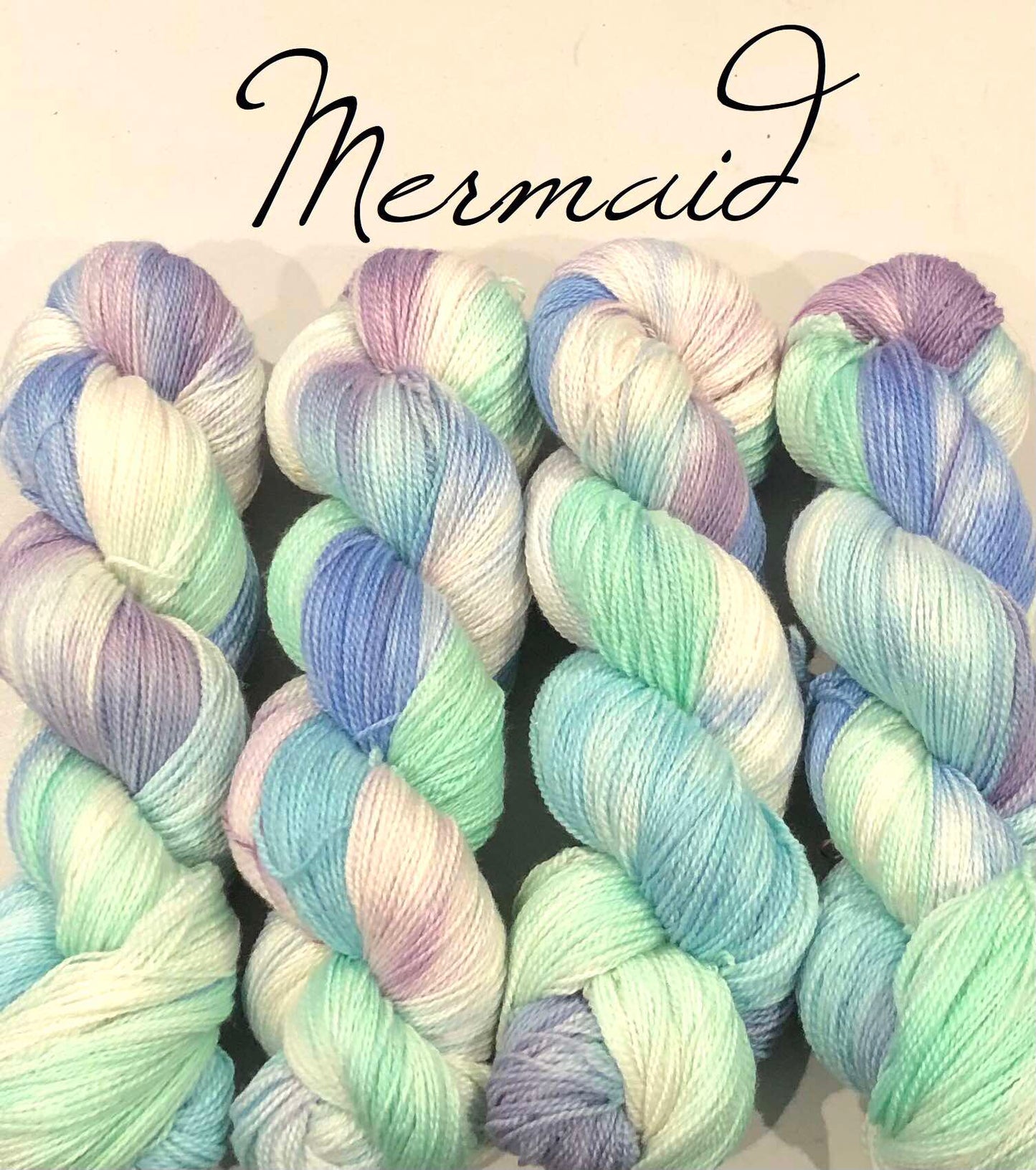 Kvitlammets Luksus merino. Mermaid. 100 g : ca 600 m.