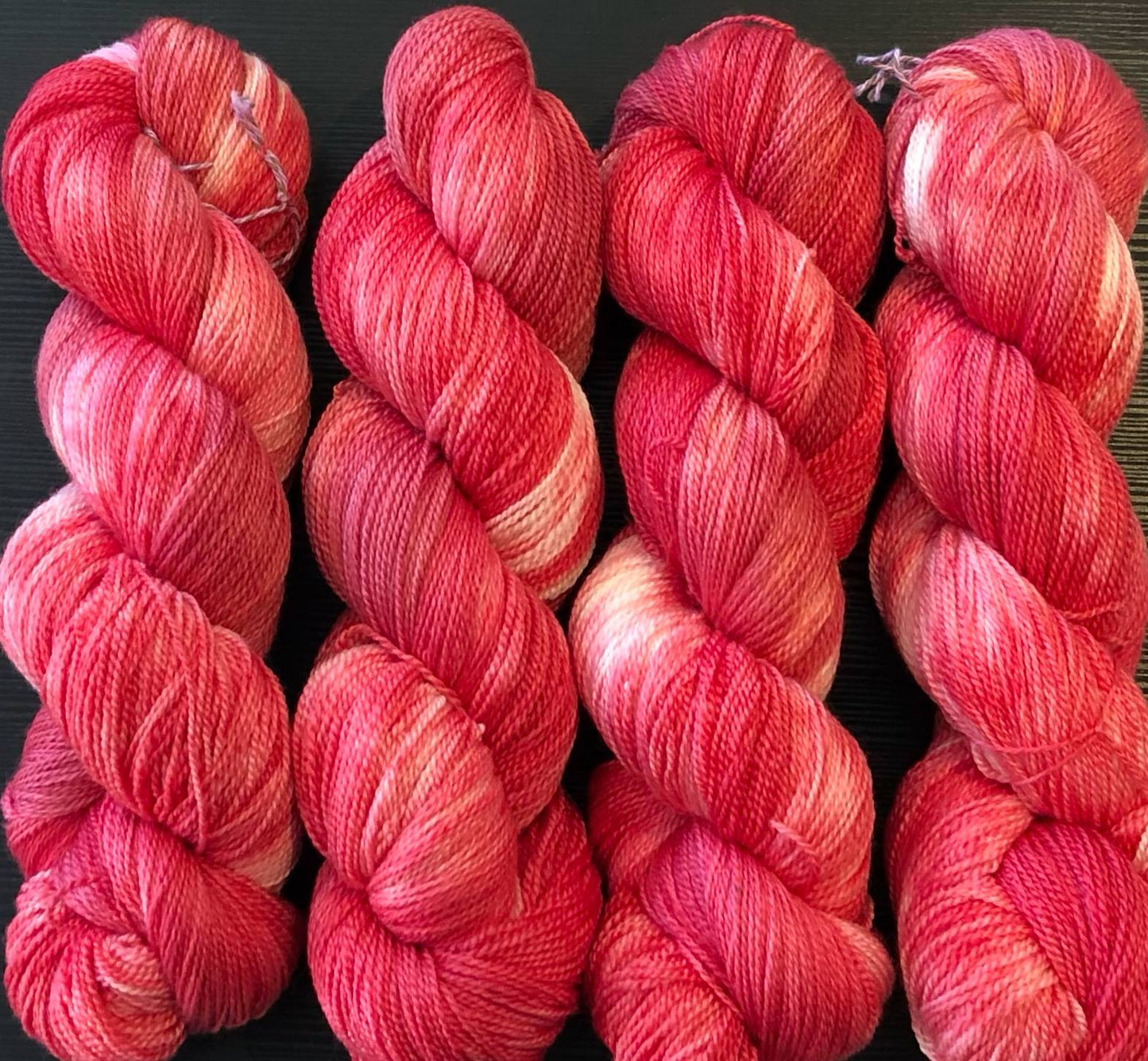 Kvitlammets Luksus merino. Trippel Rød.